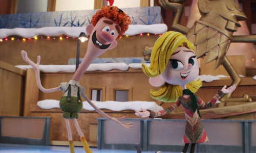 A man with curly red hair is smiling while wearing an elf costume with short shorts, standing next to a smiling blonde woman on ice skates. Both are 3D animated.