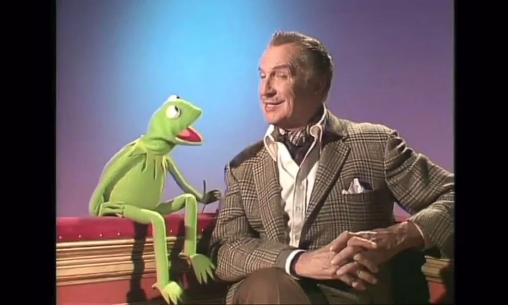 Kermit the Frog sitting next to Vincent Price.