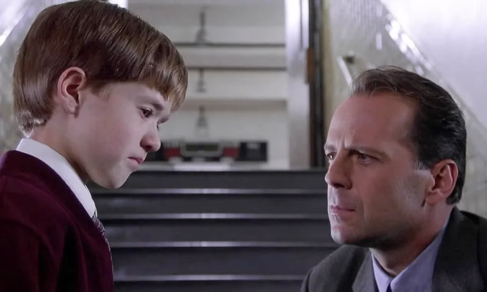 Haley Joel Osment and Bruce Willis in The Sixth Sense (1999).