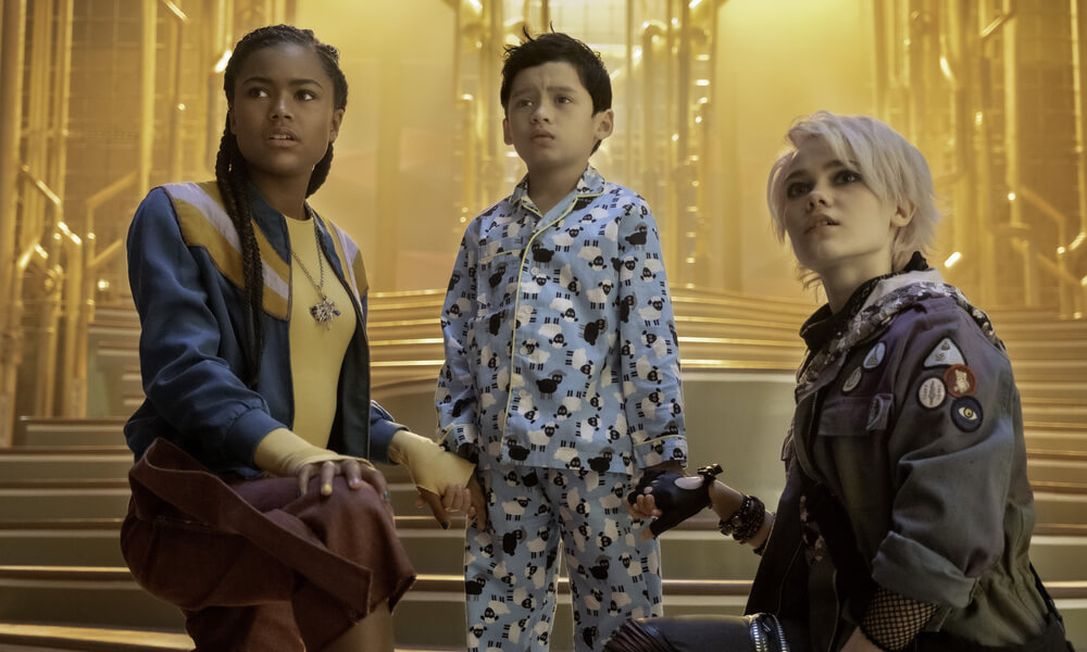 Small child with two adults in Babysitter's Guide to Monster Hunting