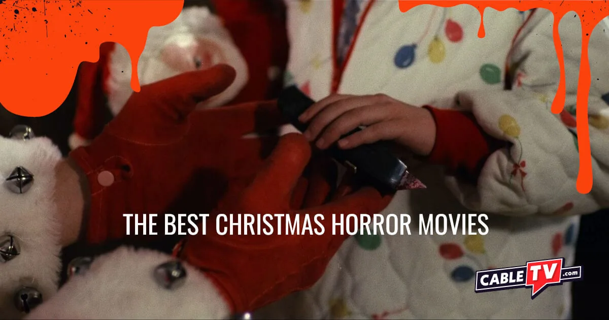A close-up shot of Santa Claus’s gloved hands handing a bloody box cutter to a little girl in pajamas. A scene from Silent Night, Deadly Night, one of the best Christmas movies.