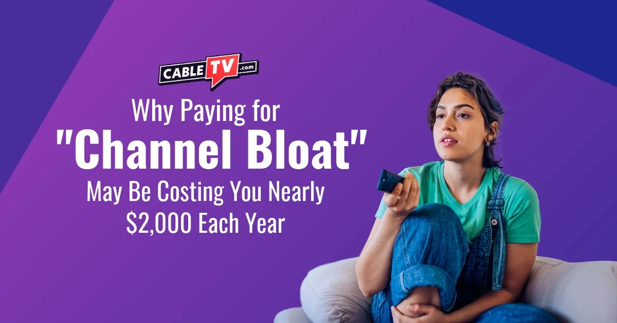 Woman sitting on a sofa with a remote control.