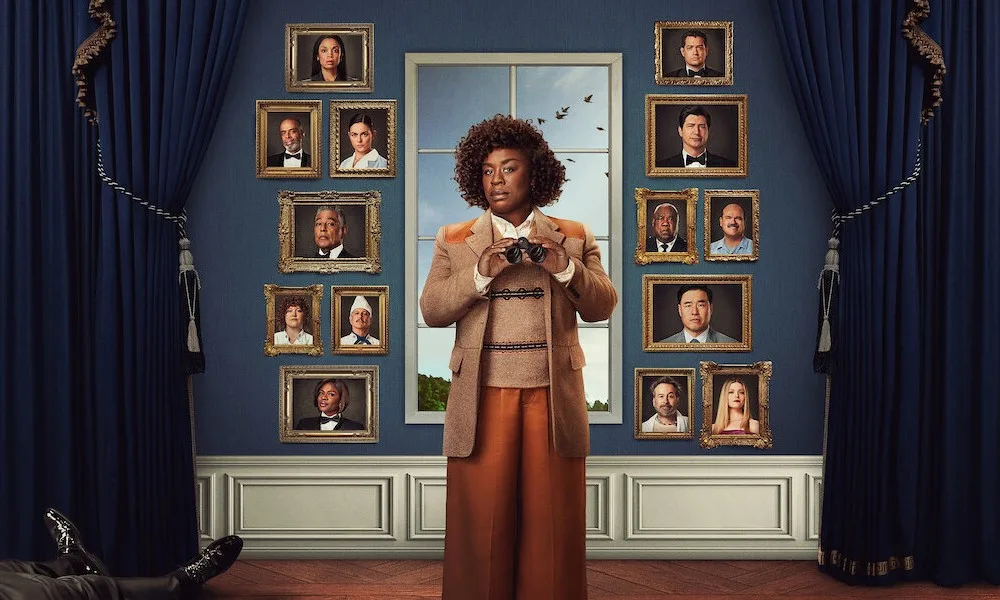 A woman in a tweed jacket holds up binoculars in front of a wall of framed portraits. A dead body sits in the background.