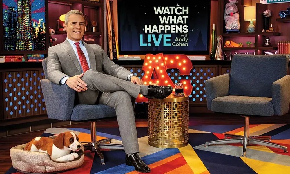 Promotional image for Watch What Happens Live (Bravo) shows host Andy Cohen relaxing on set. Part of CableTV.com's Late-Night TV This Week column.